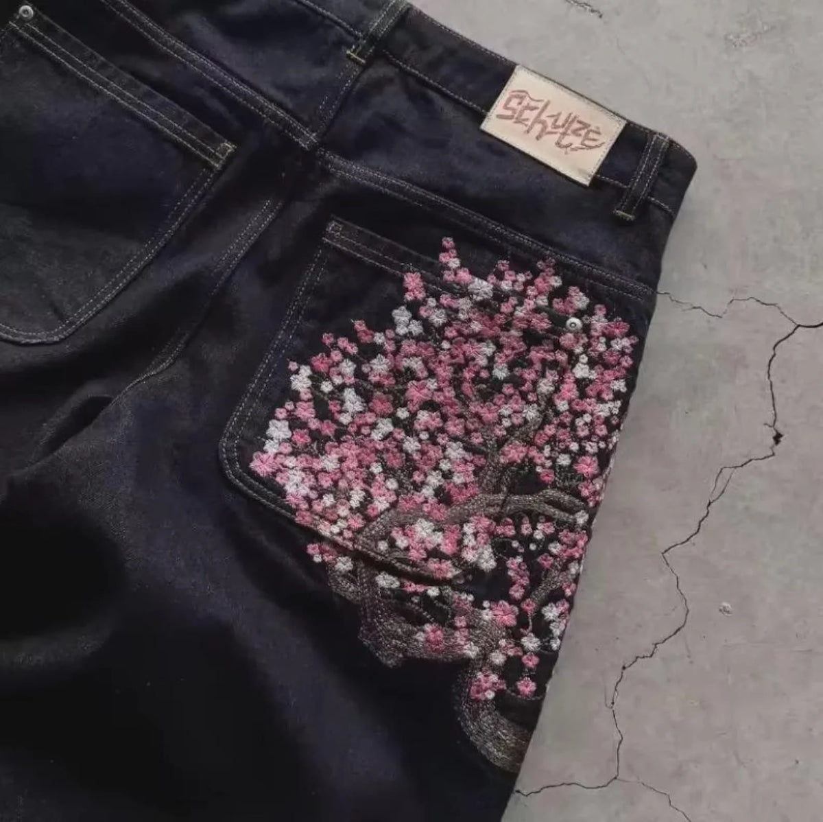 Baggy Flare Jeans with Dollar Sign Embroidery – Y2K Wide Leg Denim