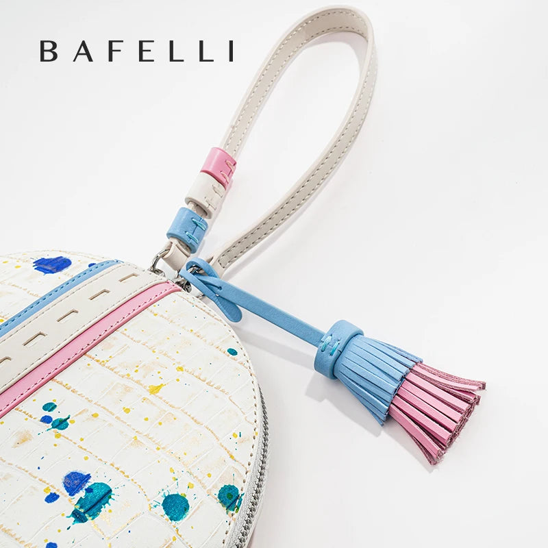 Designer Leather Wristlet Clutch Bag with Tassel Detail