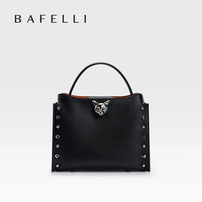 Cowhide Leather Rivet Handbag with Adjustable Crossbody Strap